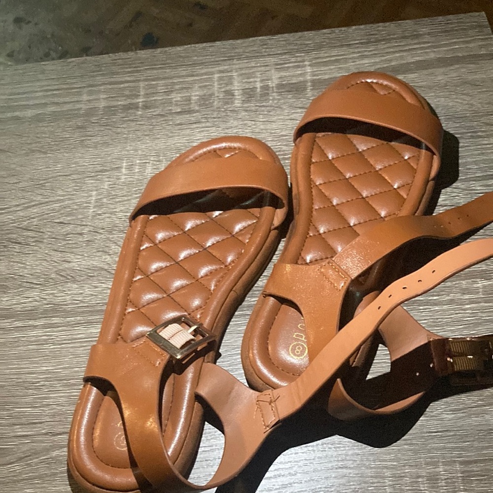 Size eights the color of the flats are brown